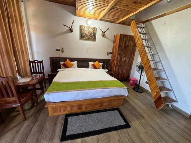 Imagen de la habitación del Hotel Lap of Himalayas Resort Kausani. Foto 14
