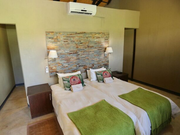 Imagen de la habitación del Hotel Lapa Lange Game Lodge. Foto 17