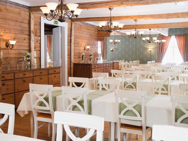 Imagen del bar/restaurante del Hotel Lapland Hotels Ounasvaara Chalets. Foto 5