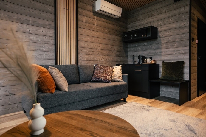 Imagen de la habitación del Hotel Lapland Winter Park Chalets. Foto 10