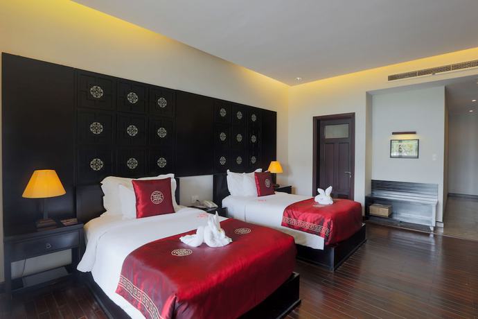 Imagen de la habitación del Hotel Lapochine Beach Resort. Foto 8