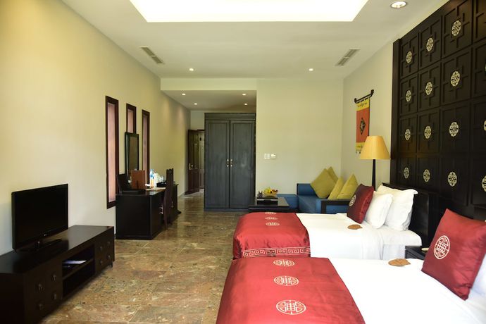 Imagen de la habitación del Hotel Lapochine Beach Resort. Foto 13