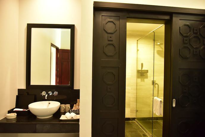 Imagen de la habitación del Hotel Lapochine Beach Resort. Foto 14