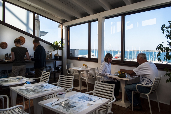 Imagen del bar/restaurante del Hotel L'approdo Delle Sirene. Foto 4