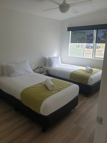 Imagen de la habitación del Hotel Lara Lodge. Foto 19