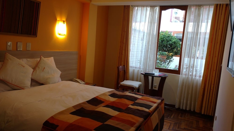 Imagen de la habitación del Hotel Laramani Boutique. Foto 10