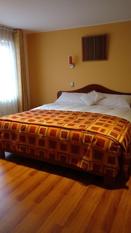 Imagen de la habitación del Hotel Laramani Boutique. Foto 16