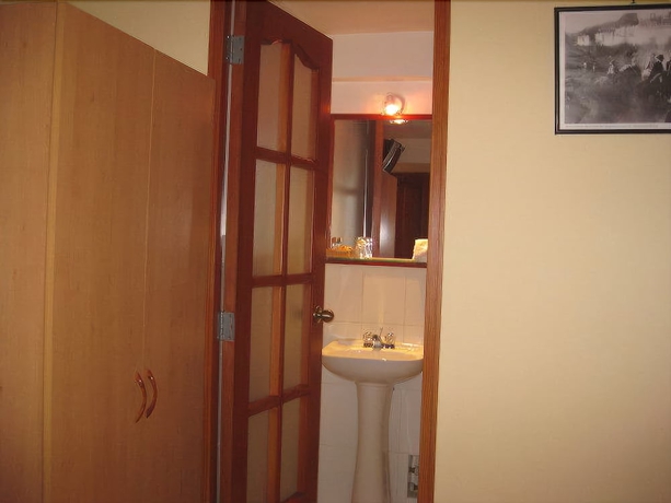 Imagen de la habitación del Hotel Laramani Boutique. Foto 18
