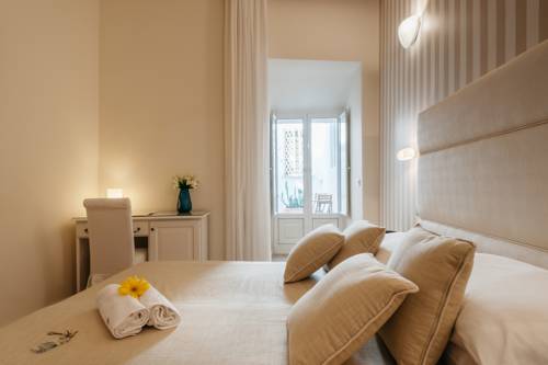 Imagen de la habitación del Hotel L'arcangelo - Boutique. Foto 8