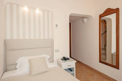 Imagen de la habitación del Hotel L'arcangelo - Boutique. Foto 11
