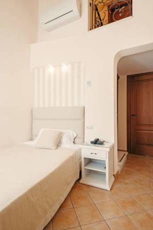 Imagen de la habitación del Hotel L'arcangelo - Boutique. Foto 12