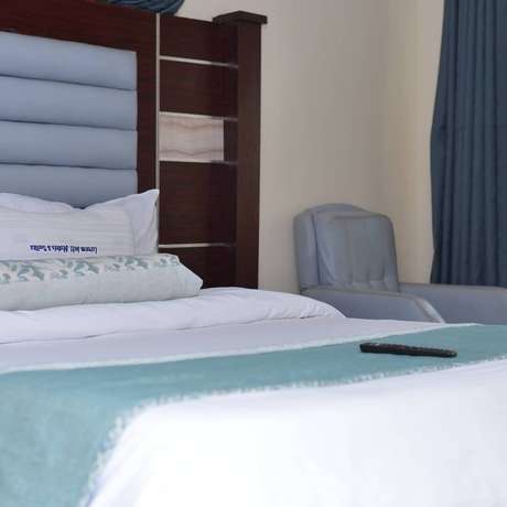 Imagen de la habitación del Hotel Larema Internationals and suites. Foto 10