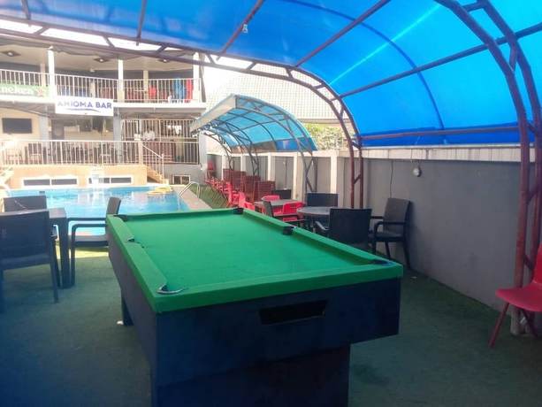 Imagen del bar/restaurante del Hotel Larema Internationals and suites. Foto 4