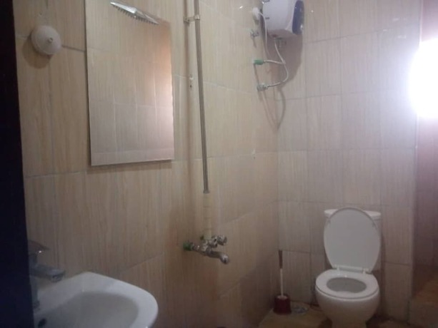 Imagen de la habitación del Hotel Larema Internationals and suites. Foto 14