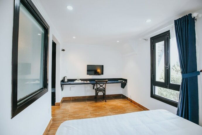 Imagen de la habitación del Hotel Larita Dalat Boutique Hotel. Foto 8