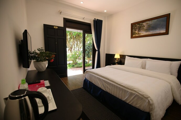 Imagen de la habitación del Hotel Larita Dalat Boutique Hotel. Foto 9