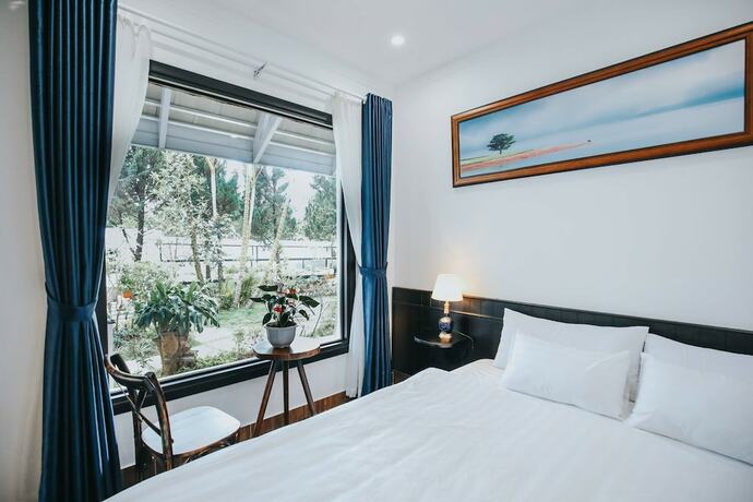 Imagen de la habitación del Hotel Larita Dalat Boutique Hotel. Foto 12