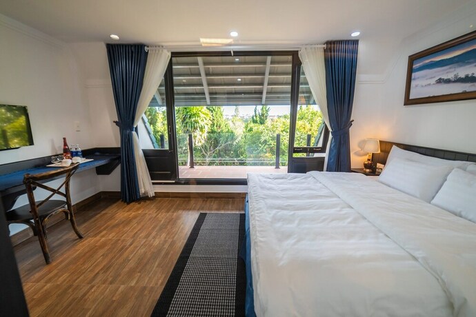 Imagen de la habitación del Hotel Larita Dalat Boutique Hotel. Foto 13