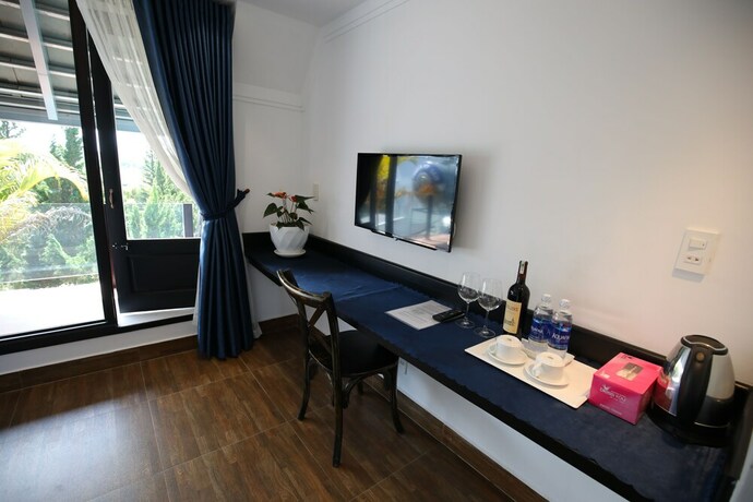 Imagen de la habitación del Hotel Larita Dalat Boutique Hotel. Foto 14
