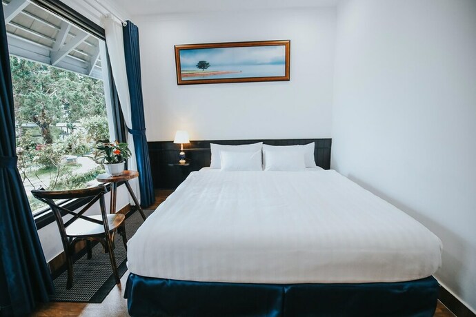 Imagen de la habitación del Hotel Larita Dalat Boutique Hotel. Foto 15