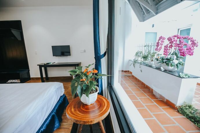 Imagen de la habitación del Hotel Larita Dalat Boutique Hotel. Foto 16