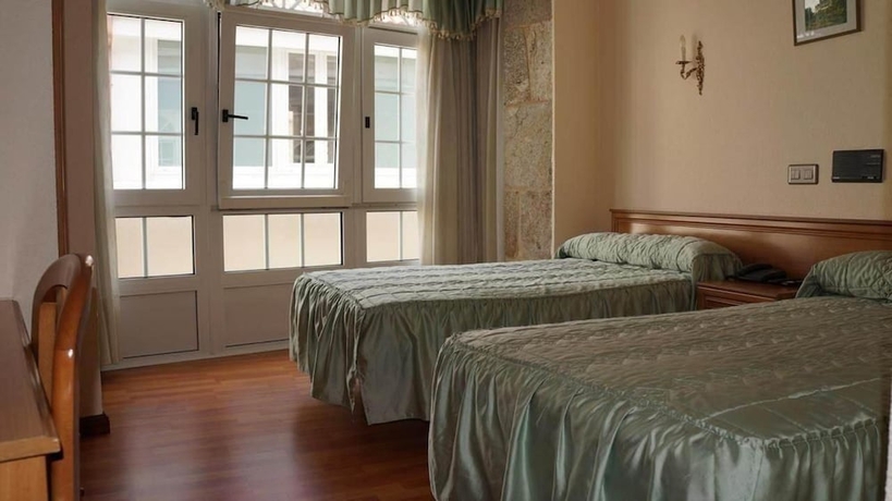 Imagen de la habitación del Hotel Larry. Foto 5