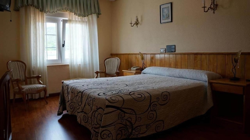 Imagen de la habitación del Hotel Larry. Foto 7