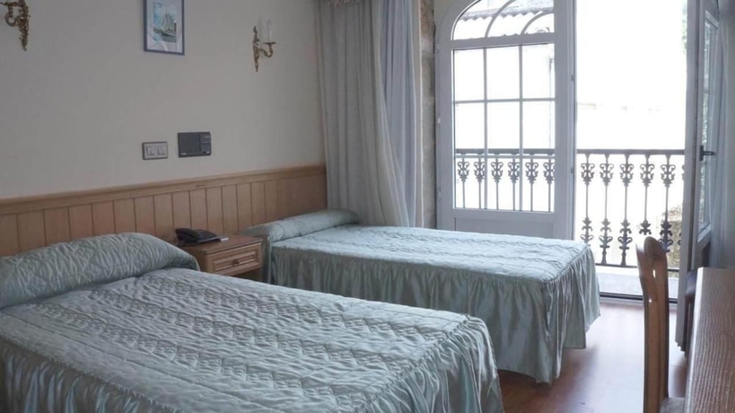 Imagen de la habitación del Hotel Larry. Foto 8