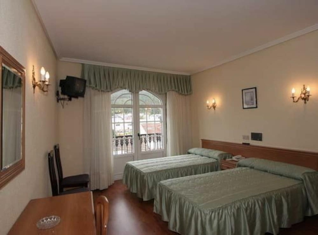 Imagen de la habitación del Hotel Larry. Foto 10