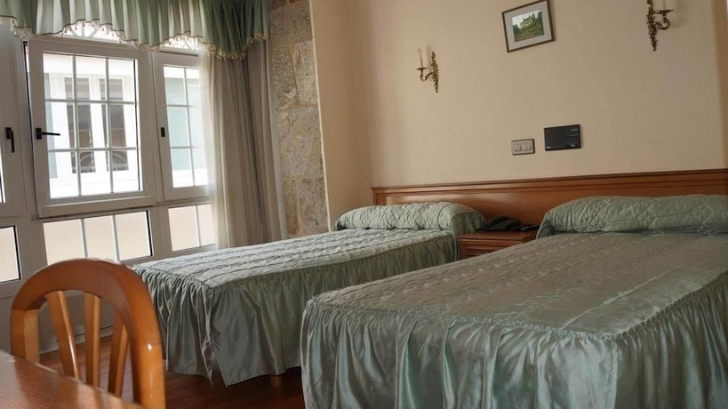 Imagen de la habitación del Hotel Larry. Foto 13