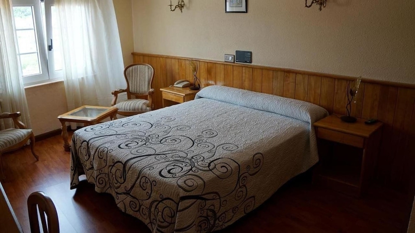 Imagen de la habitación del Hotel Larry. Foto 14