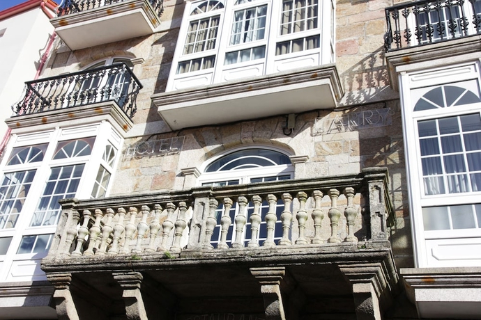 Imagen de la habitación del Hotel Larry. Foto 17