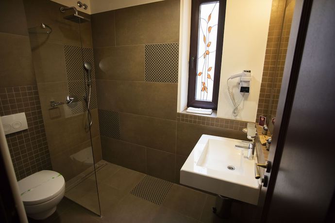 Imagen de la habitación del Hotel L\'art Carei. Foto 2