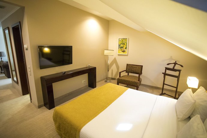 Imagen de la habitación del Hotel L\'art Carei. Foto 3