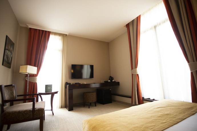 Imagen de la habitación del Hotel L\'art Carei. Foto 10