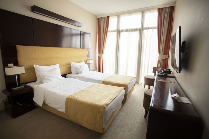 Imagen de la habitación del Hotel L\'art Carei. Foto 11