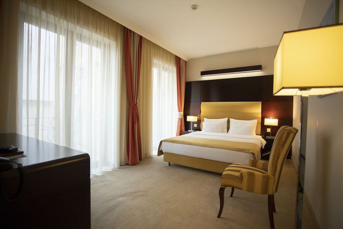 Imagen de la habitación del Hotel L\'art Carei. Foto 14