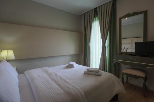 Imagen de la habitación del Hotel L'art De Vivre. Foto 10