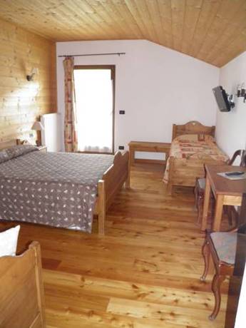 Imagen de la habitación del Hotel L'artisin. Foto 1