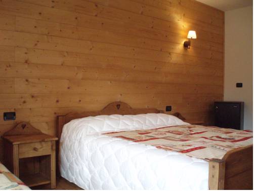 Imagen de la habitación del Hotel L'artisin. Foto 3