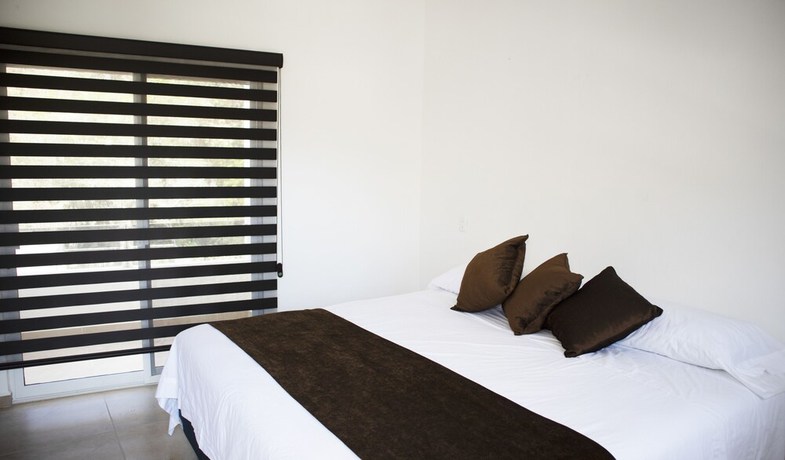 Imagen de la habitación del Hotel Lar&uacute; Spa Resort. Foto 8