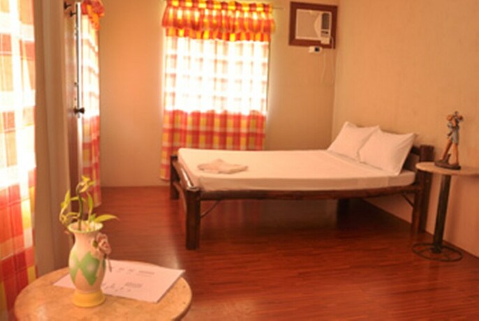 Imagen de la habitación del Hotel Larville Pool Garden Resort and Restaurant. Foto 22