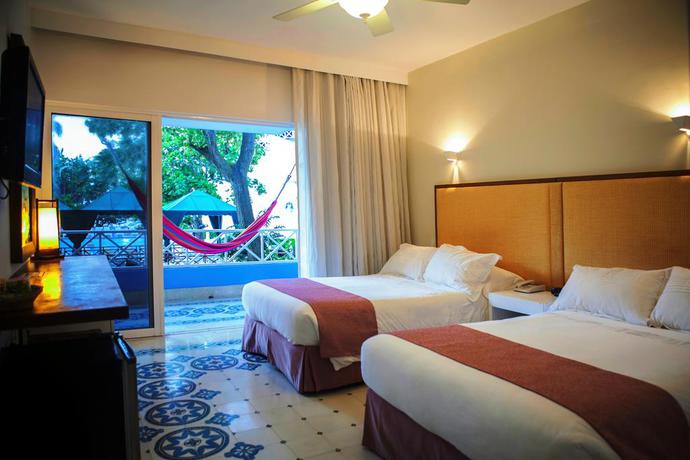 Imagen de la habitación del Hotel Las Americas Casa De Playa. Foto 4