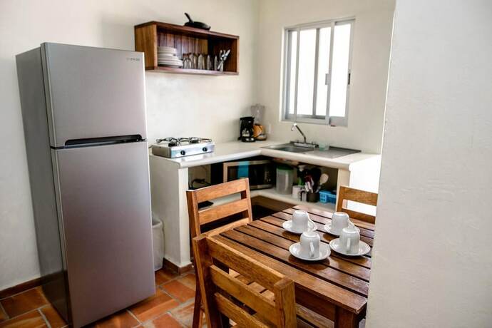 Imagen de la habitación del Hotel Las Arenas Bungalows Melaque. Foto 20