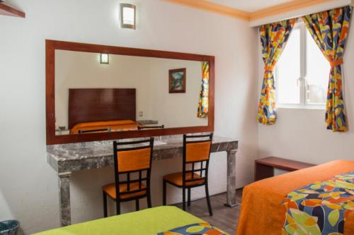 Imagen de la habitación del Hotel Las Avenidas. Foto 5