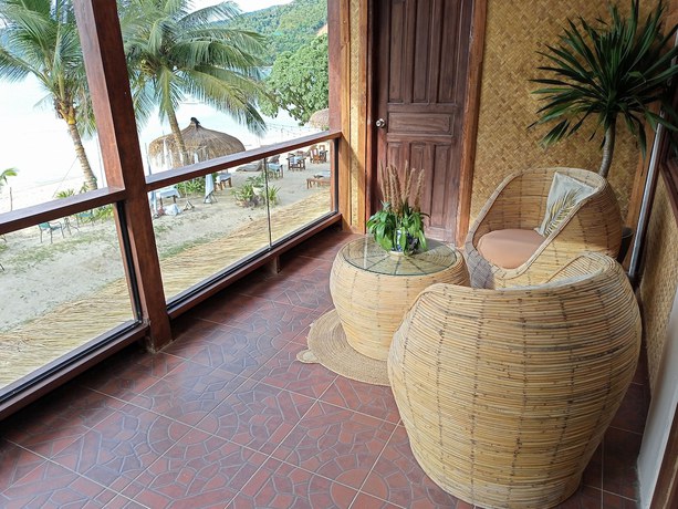 Imagen de la habitación del Hotel Las Cabanas Beach Resort. Foto 6