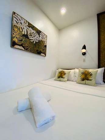 Imagen de la habitación del Hotel Las Cabanas Beach Resort. Foto 8