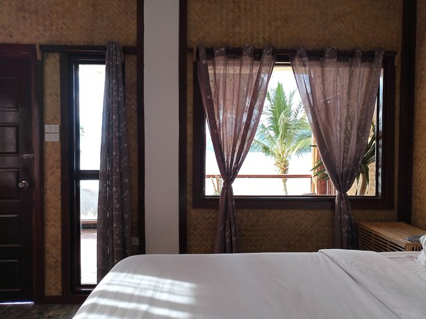 Imagen de la habitación del Hotel Las Cabanas Beach Resort. Foto 9