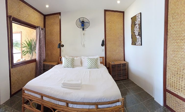 Imagen de la habitación del Hotel Las Cabanas Beach Resort. Foto 14