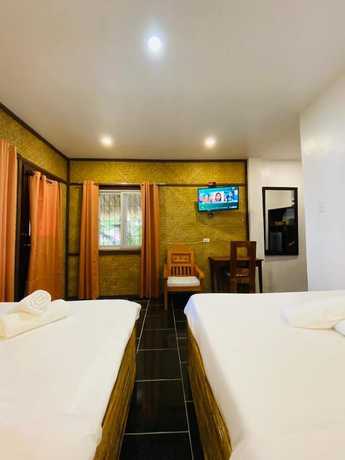Imagen de la habitación del Hotel Las Cabanas Beach Resort. Foto 15